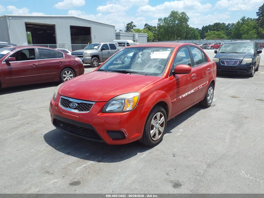 2011 Kia Rio VIN KNADH4A39B6731369 IAAI salvage auction — NORMAL WEAR, Clear, sold $225 on 2026-07-22 (photo 2)