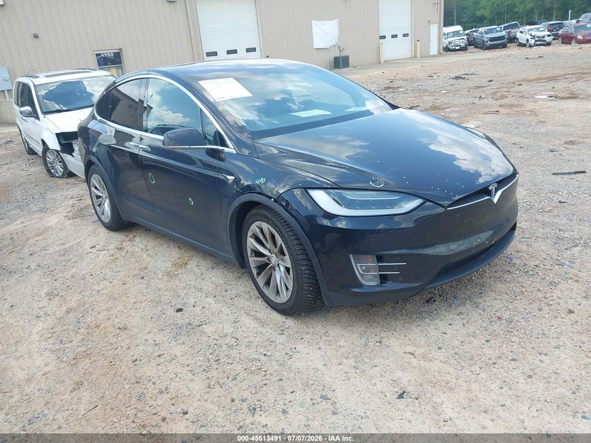 2018 Tesla Model x VIN 5YJXCDE25JF112299 — IAAI salvage auction photo