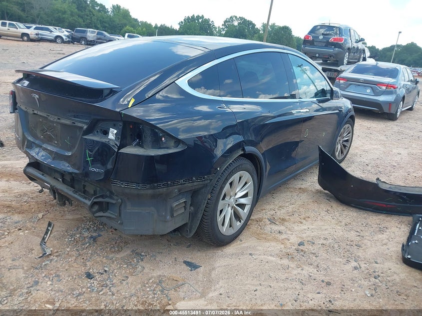 2018 Tesla Model x VIN 5YJXCDE25JF112299 IAAI salvage auction — REAR END, Salvage Title, sold $9,075 on 2026-08-20 (photo 4)