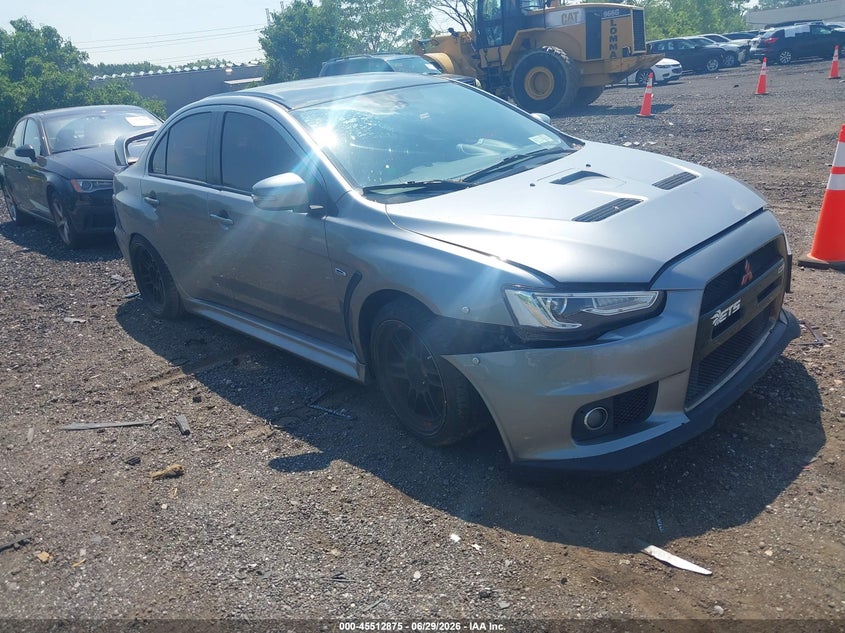 2015 Mitsubishi Lancer evolution VIN JA32W7FV1FU028439 IAAI salvage auction — NORMAL WEAR, Clear (New York), sold $13,100 on 2026-07-07 (photo 1)