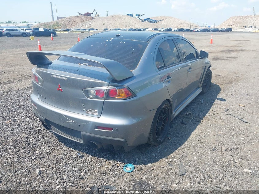 2015 Mitsubishi Lancer evolution VIN JA32W7FV1FU028439 IAAI salvage auction — NORMAL WEAR, Clear (New York), sold $13,100 on 2026-07-07 (photo 4)