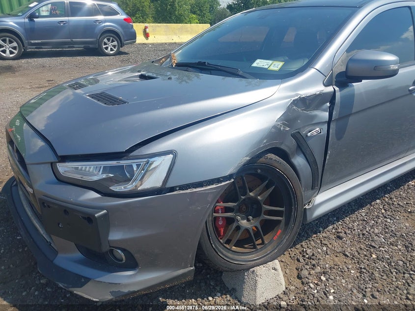 2015 Mitsubishi Lancer evolution VIN JA32W7FV1FU028439 IAAI salvage auction — NORMAL WEAR, Clear (New York), sold $13,100 on 2026-07-07 (photo 6)