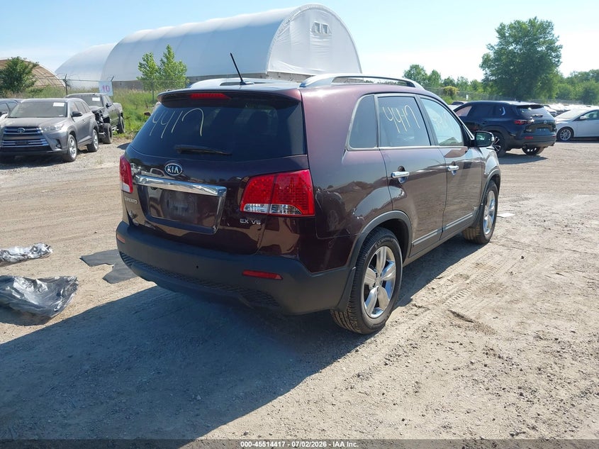 2012 Kia Sorento VIN 5XYKUDA21CG252469 IAAI salvage auction — NORMAL WEAR, Regular Certificate (Iowa), sold $1,600 on 2026-07-13 (photo 4)