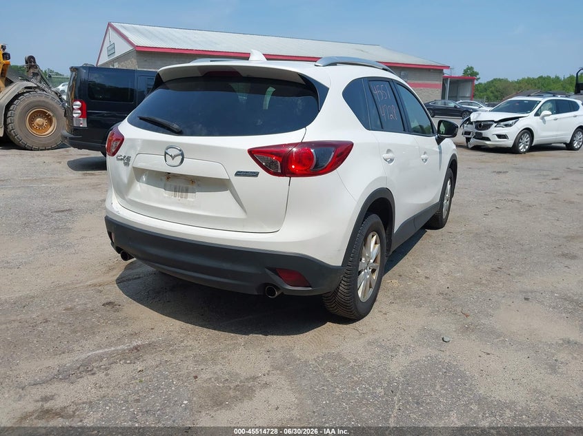 2014 Mazda Cx-5 VIN JM3KE4CY6E0329741 IAAI salvage auction — NORMAL WEAR, Original (Maine), sold $3,300 on 2026-07-06 (photo 4)