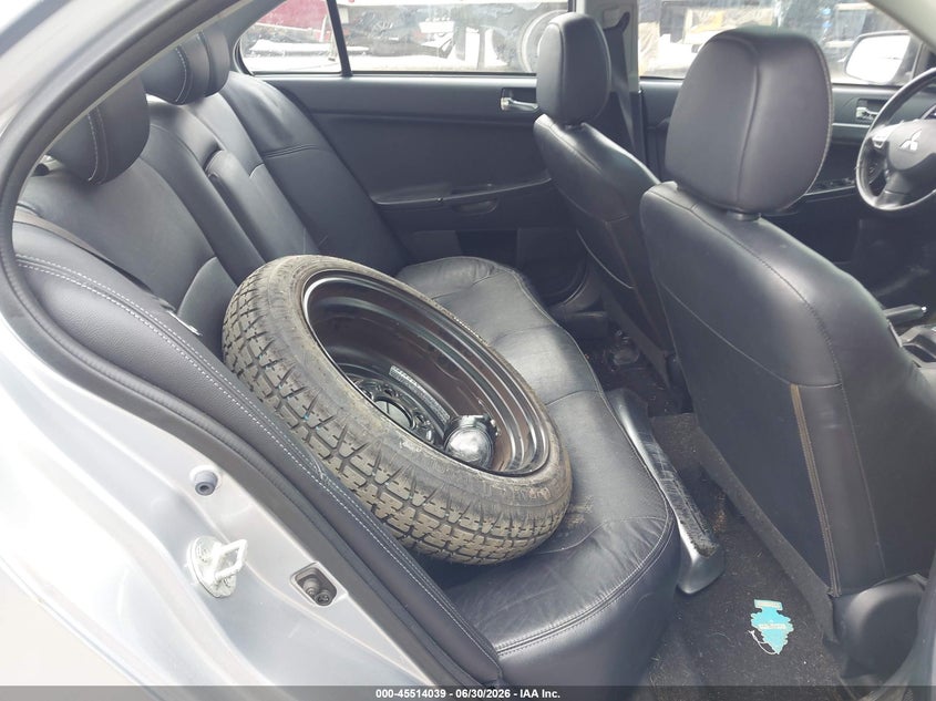 2011 Mitsubishi Lancer VIN JA32U8FWXBU000363 IAAI salvage auction — NORMAL WEAR, Clear (New York), sold $450 on 2026-07-28 (photo 8)