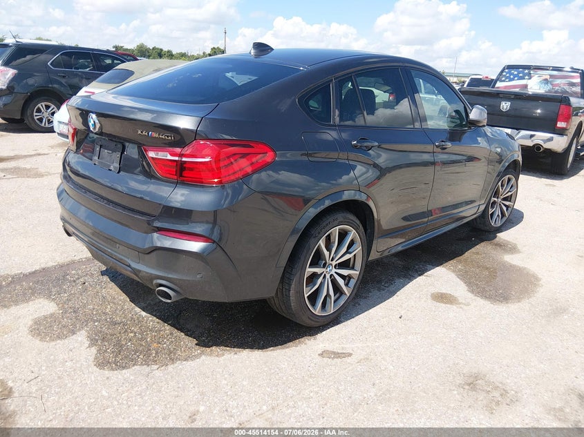 2017 BMW X4 VIN 5UXXW7C38H0U26444 IAAI salvage auction — NORMAL WEAR, Original (Texas), sold $2,050 on 2026-07-29 (photo 4)