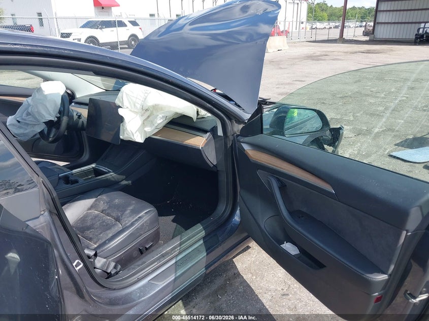 2023 Tesla Model 3 VIN 5YJ3E1EA5PF429703 IAAI salvage auction — FRONT END, Rebuildable (Florida), sold $5,100 on 2026-07-30 (photo 5)