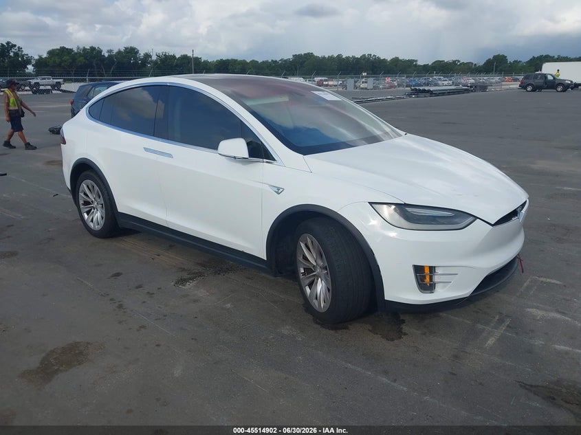 2016 Tesla Model x VIN 5YJXCBE26GF021247 IAAI salvage auction — NORMAL WEAR, Clear (Florida), sold $7,900 on 2026-07-29 (photo 1)