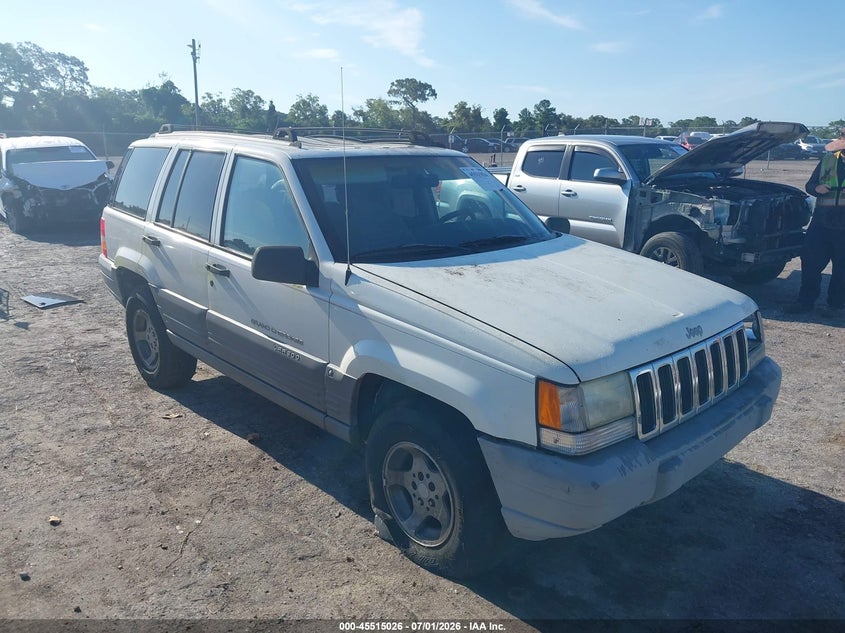 1997 Jeep Grand cherokee VIN 1J4FX58S2VC730906 IAAI salvage auction — LEFT SIDE, Rebuildable (Florida), sold $300 on 2026-07-29 (photo 1)