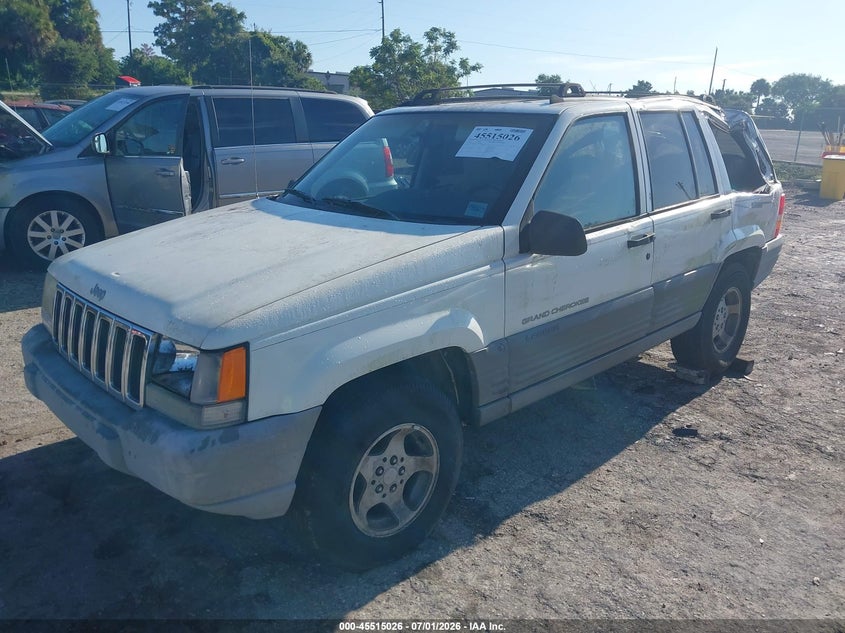 1997 Jeep Grand cherokee VIN 1J4FX58S2VC730906 IAAI salvage auction — LEFT SIDE, Rebuildable (Florida), sold $300 on 2026-07-29 (photo 2)
