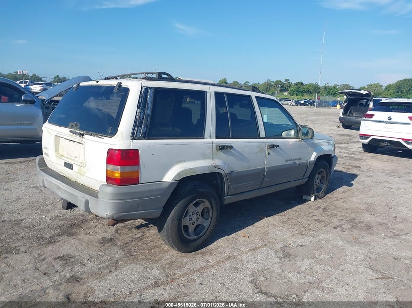 1997 Jeep Grand cherokee VIN 1J4FX58S2VC730906 IAAI salvage auction — LEFT SIDE, Rebuildable (Florida), sold $300 on 2026-07-29 (photo 4)