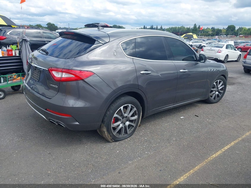 2017 Maserati Levante VIN ZN661XUL4HX224524 IAAI salvage auction — LEFT SIDE, Wait Title, sold $2,600 on 2026-10-01 (photo 4)