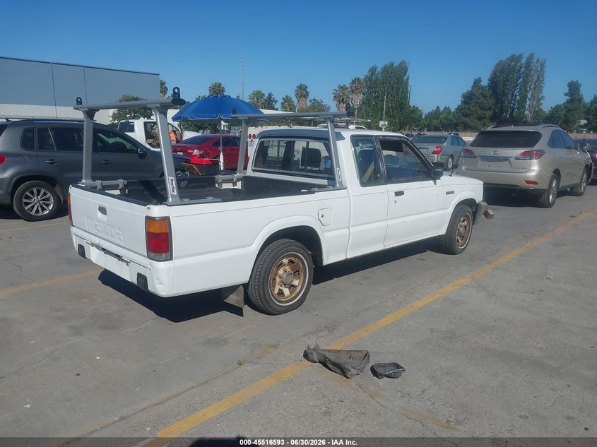 1987 Mazda B2000 VIN JM2UF3117H0605018 IAAI salvage auction — LEFT FRONT, Salvage (California), sold $450 on 2026-07-29 (photo 4)