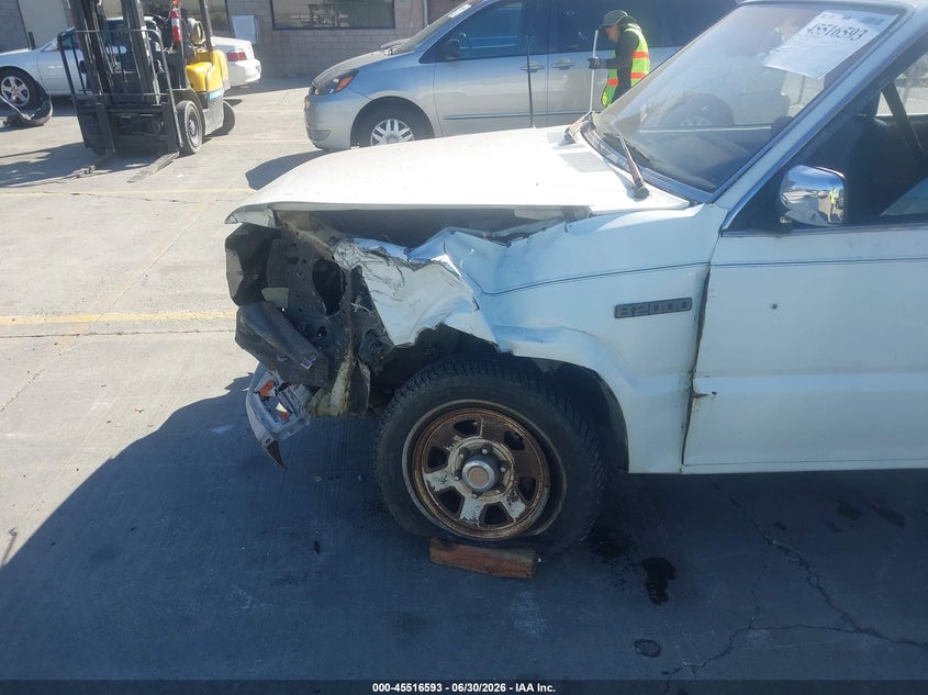1987 Mazda B2000 VIN JM2UF3117H0605018 IAAI salvage auction — LEFT FRONT, Salvage (California), sold $450 on 2026-07-29 (photo 6)