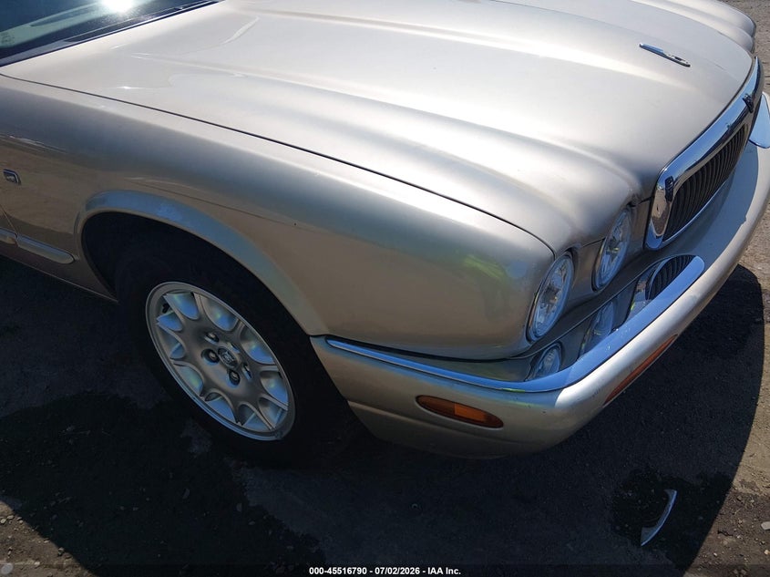 2000 Jaguar Xj series VIN SAJDA23CXYLF19006 IAAI salvage auction — NORMAL WEAR, Clear (New Mexico), sold $475 on 2026-07-13 (photo 6)
