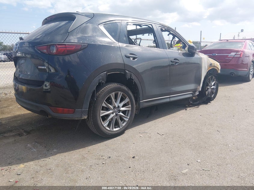 2021 Mazda Cx-5 VIN JM3KFADM2M1319871 IAAI salvage auction — ENGINE BURN, Salvage Title, sold $350 on 2026-08-24 (photo 4)