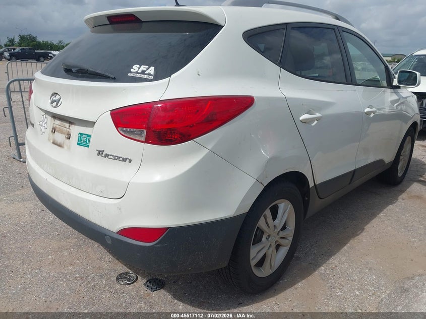2010 Hyundai Tucson VIN KM8JU3AC6AU088741 IAAI salvage auction — NORMAL WEAR, Original (Texas), sold $1,850 on 2026-07-08 (photo 4)