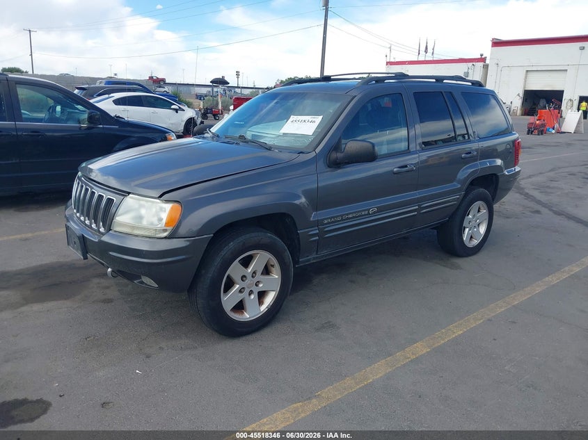 2002 Jeep Grand cherokee VIN 1J8GW68JX2C156070 IAAI salvage auction — NORMAL WEAR, Clear (Utah), sold $550 on 2026-07-09 (photo 2)