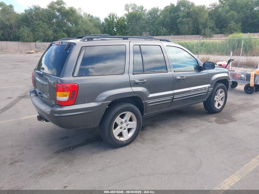 2002 Jeep Grand cherokee VIN 1J8GW68JX2C156070 IAAI salvage auction — NORMAL WEAR, Clear (Utah), sold $550 on 2026-07-09 (photo 4)