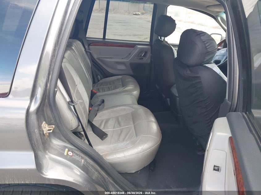 2002 Jeep Grand cherokee VIN 1J8GW68JX2C156070 IAAI salvage auction — NORMAL WEAR, Clear (Utah), sold $550 on 2026-07-09 (photo 8)
