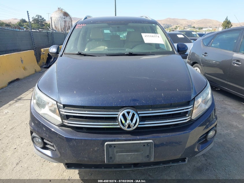 2014 Volkswagen Tiguan VIN WVGAV3AX6EW553089 IAAI salvage auction — NORMAL WEAR, Clear - Dealer Only (California), sold $225 on 2026-07-09 (photo 6)