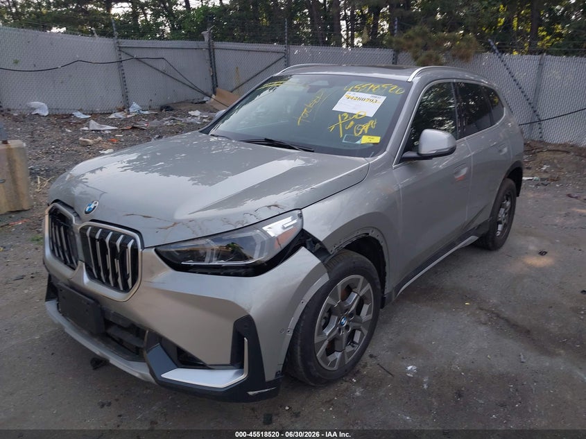 2025 BMW X1 VIN WBX73EF04S5255429 IAAI salvage auction — FRONT & REAR, Mv-907A (New York), sold $8,300 on 2026-07-21 (photo 2)
