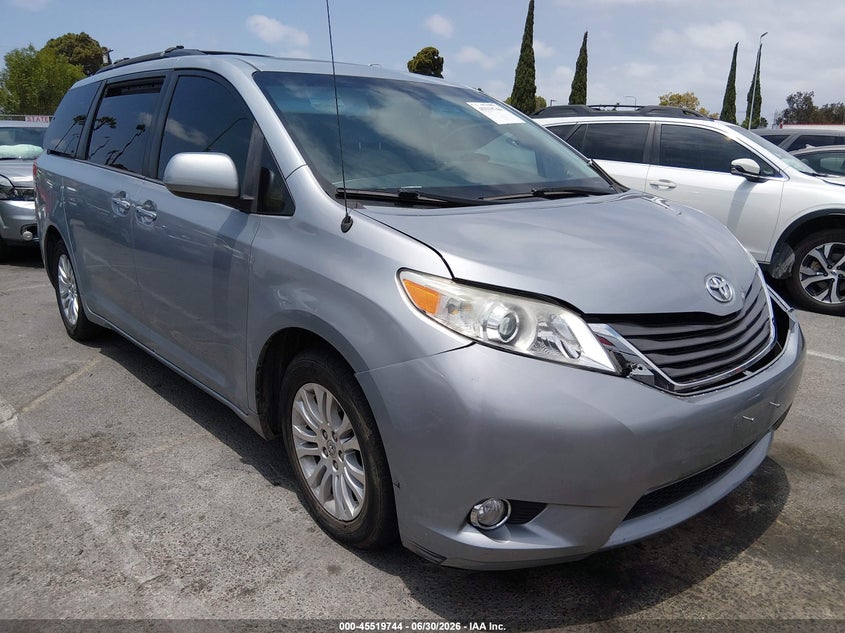 2014 Toyota Sienna VIN 5TDYK3DC3ES516344 IAAI salvage auction — LEFT FRONT, Salvage (California), sold $75 on 2026-07-31 (photo 1)