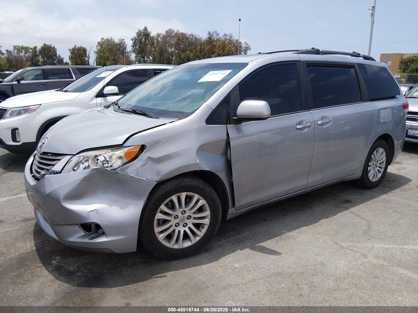 2014 Toyota Sienna VIN 5TDYK3DC3ES516344 IAAI salvage auction — LEFT FRONT, Salvage (California), sold $75 on 2026-07-31 (photo 2)