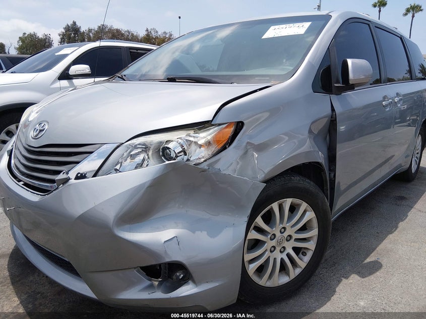 2014 Toyota Sienna VIN 5TDYK3DC3ES516344 IAAI salvage auction — LEFT FRONT, Salvage (California), sold $75 on 2026-07-31 (photo 6)