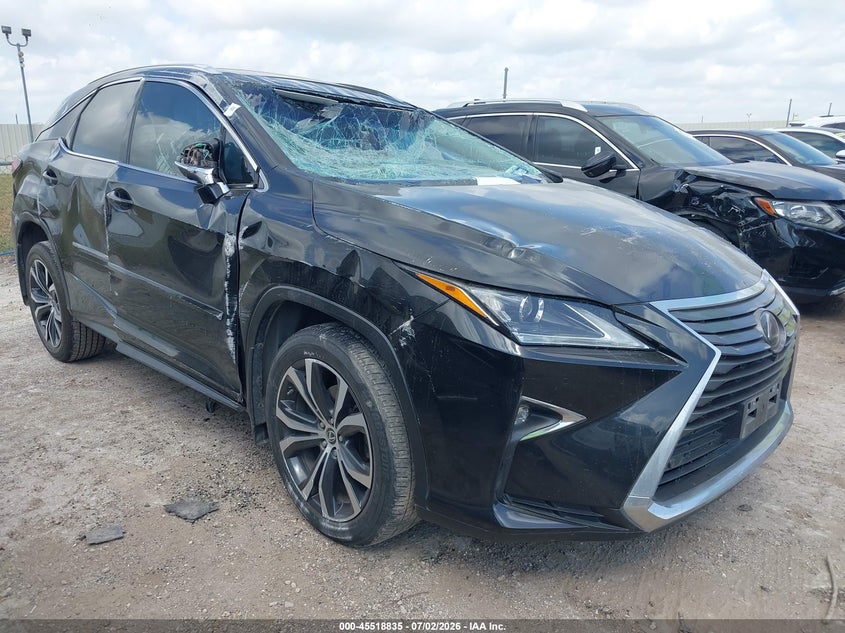 2019 Lexus Rx VIN 2T2BZMCA9KC172056 IAAI salvage auction — ROLLOVER, Salvage Title, sold $10,000 on 2026-09-10 (photo 1)