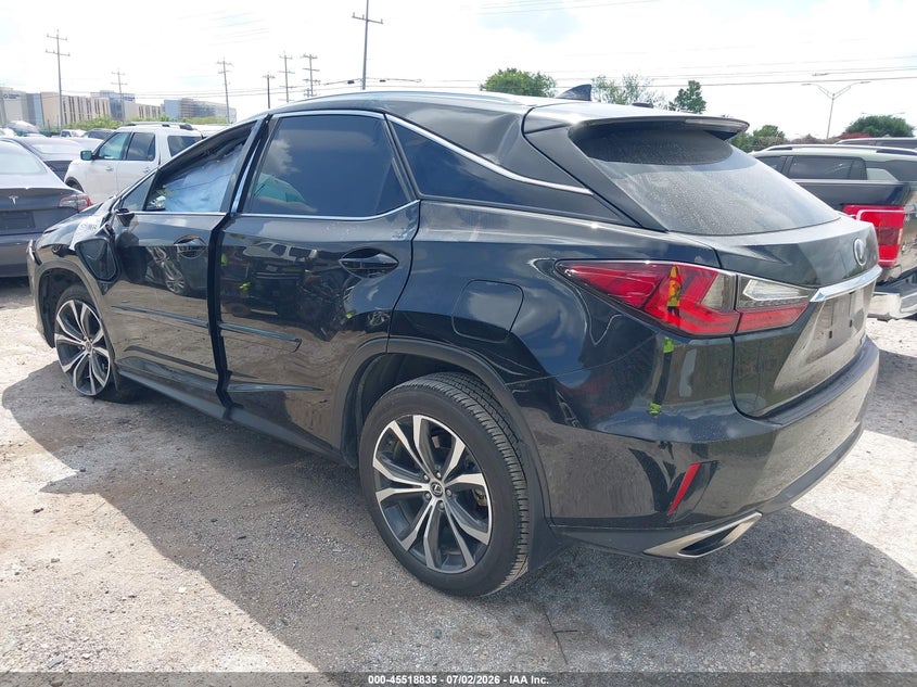 2019 Lexus Rx VIN 2T2BZMCA9KC172056 IAAI salvage auction — ROLLOVER, Salvage Title, sold $10,000 on 2026-09-10 (photo 3)