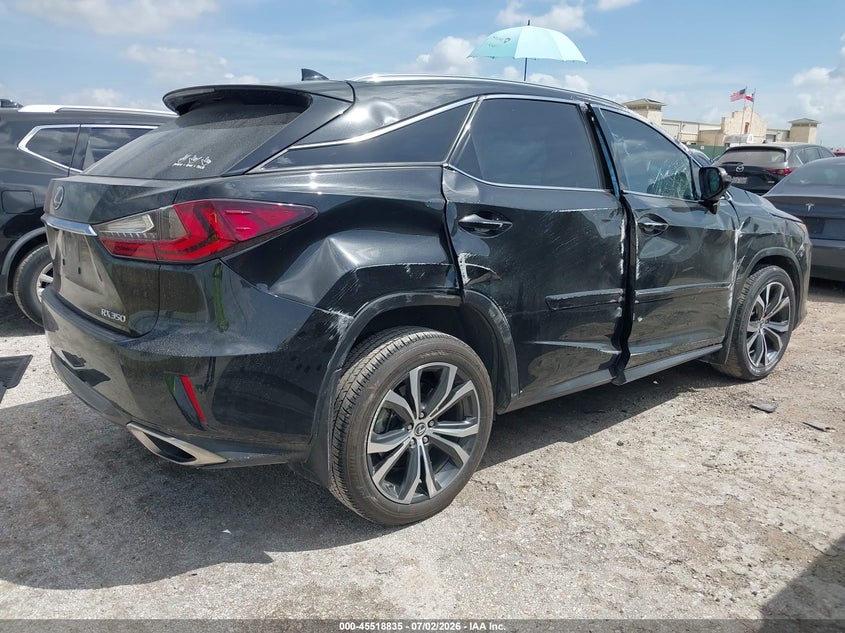 2019 Lexus Rx VIN 2T2BZMCA9KC172056 IAAI salvage auction — ROLLOVER, Salvage Title, sold $10,000 on 2026-09-10 (photo 4)