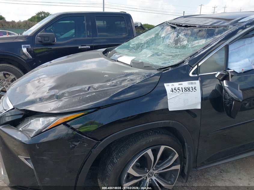 2019 Lexus Rx VIN 2T2BZMCA9KC172056 IAAI salvage auction — ROLLOVER, Salvage Title, sold $10,000 on 2026-09-10 (photo 6)