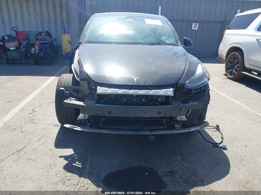 2023 Tesla Model y VIN 7SAYGAEE6PF767147 IAAI salvage auction — FRONT END, Salvage (California), sold $11,000 on 2026-07-13 (photo 6)
