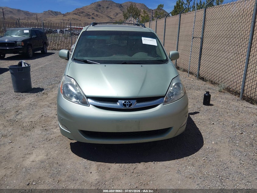 2009 Toyota Sienna VIN 5TDBK22C59S025301 IAAI salvage auction — NORMAL WEAR, Regular (Nevada), sold $425 on 2026-07-17 (photo 6)