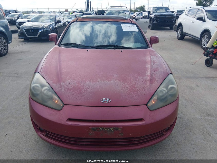 2008 Hyundai Tiburon VIN KMHHN66F58U276600 IAAI salvage auction — NORMAL WEAR, Original (Texas), sold $650 on 2026-07-10 (photo 6)