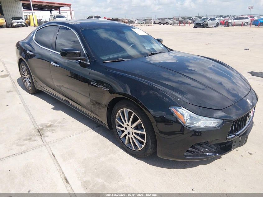 2014 Maserati Ghibli VIN ZAM57RTA5E1095324 IAAI salvage auction — WATER/FLOOD, Salvage (Texas), sold $2,975 on 2026-08-14 (photo 1)