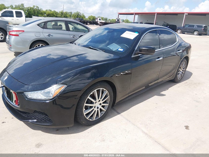2014 Maserati Ghibli VIN ZAM57RTA5E1095324 IAAI salvage auction — WATER/FLOOD, Salvage (Texas), sold $2,975 on 2026-08-14 (photo 2)