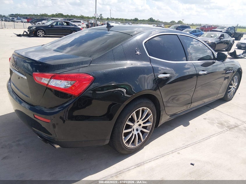 2014 Maserati Ghibli VIN ZAM57RTA5E1095324 IAAI salvage auction — WATER/FLOOD, Salvage (Texas), sold $2,975 on 2026-08-14 (photo 4)