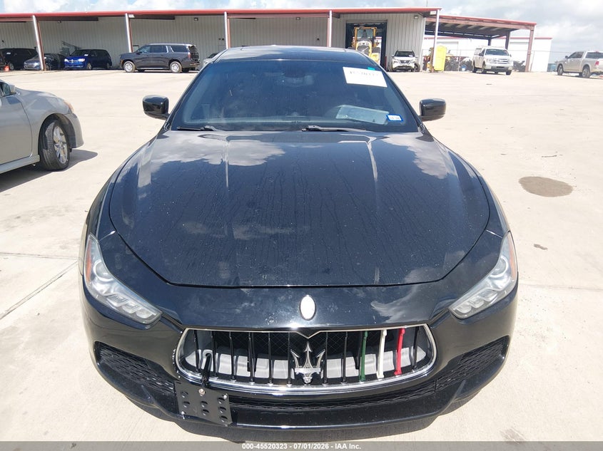 2014 Maserati Ghibli VIN ZAM57RTA5E1095324 IAAI salvage auction — WATER/FLOOD, Salvage (Texas), sold $2,975 on 2026-08-14 (photo 6)