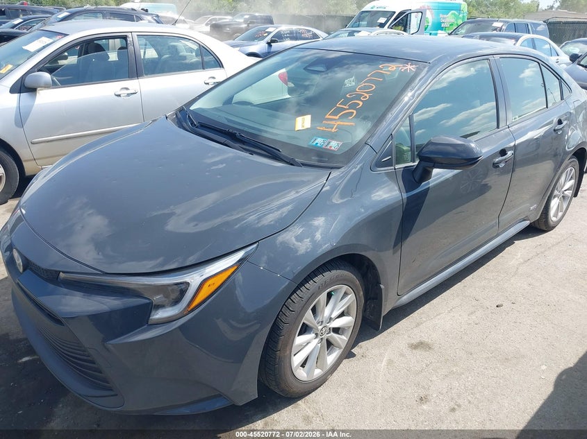 2023 Toyota Corolla VIN JTDBDMHE7P3006777 IAAI salvage auction — HAIL, Salvage Title, sold $7,300 on 2026-07-21 (photo 2)