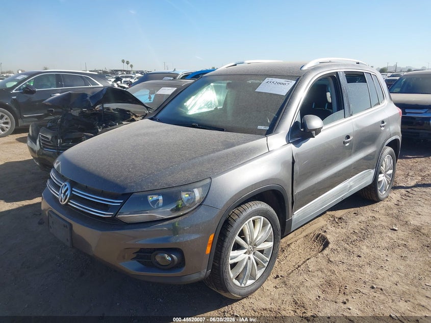 2014 Volkswagen Tiguan VIN WVGBV3AX2EW527254 IAAI salvage auction — NORMAL WEAR, Clear-Dealer Only (Michigan), sold $275 on 2026-07-28 (photo 2)