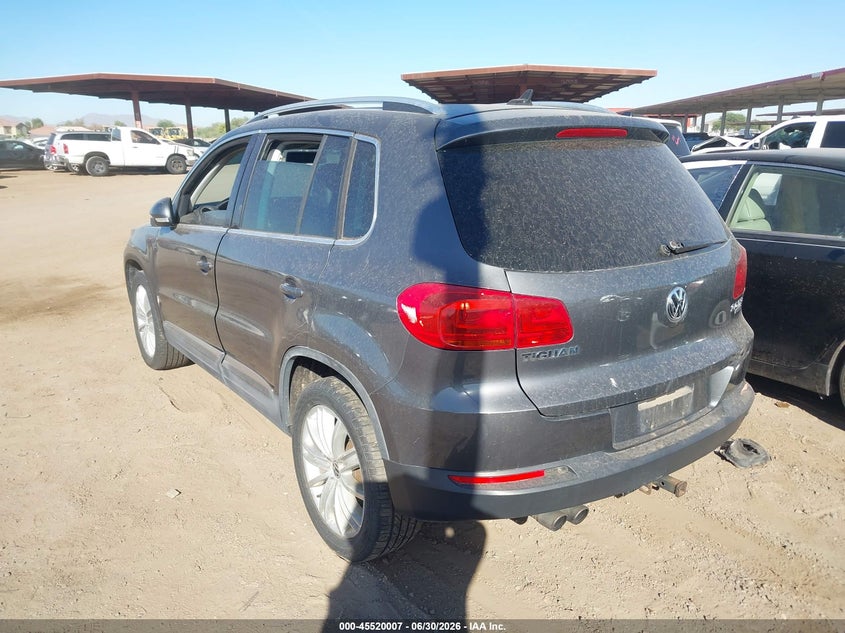 2014 Volkswagen Tiguan VIN WVGBV3AX2EW527254 IAAI salvage auction — NORMAL WEAR, Clear-Dealer Only (Michigan), sold $275 on 2026-07-28 (photo 3)