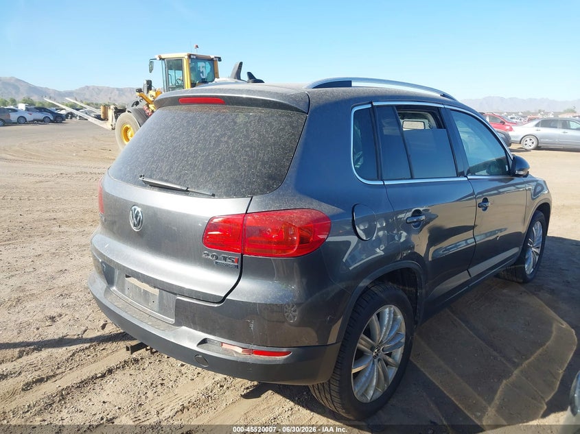 2014 Volkswagen Tiguan VIN WVGBV3AX2EW527254 IAAI salvage auction — NORMAL WEAR, Clear-Dealer Only (Michigan), sold $275 on 2026-07-28 (photo 4)