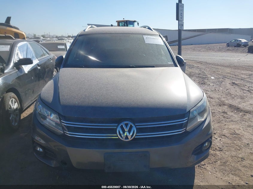 2014 Volkswagen Tiguan VIN WVGBV3AX2EW527254 IAAI salvage auction — NORMAL WEAR, Clear-Dealer Only (Michigan), sold $275 on 2026-07-28 (photo 6)