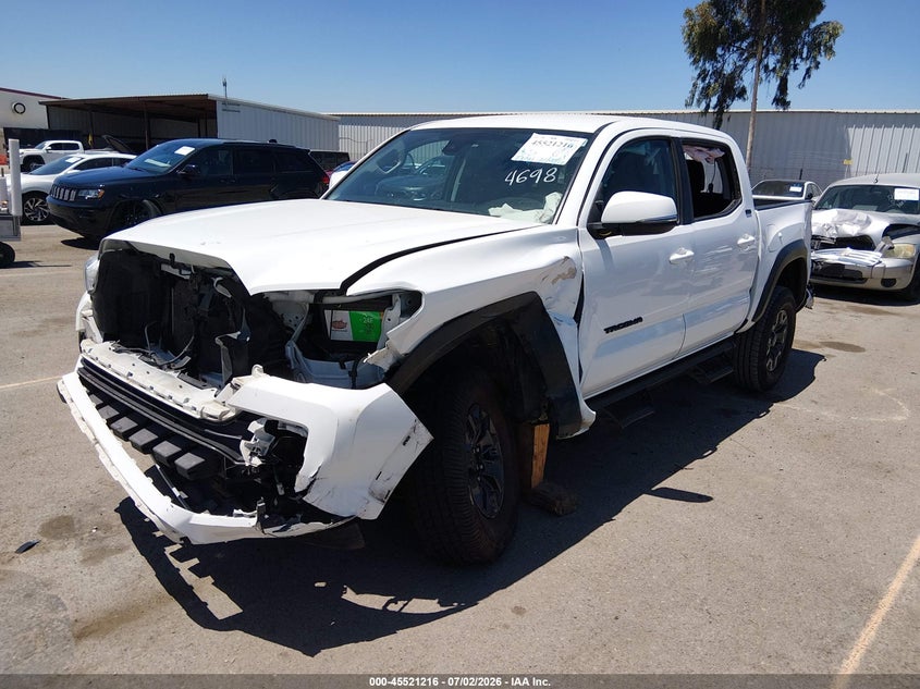 2021 Toyota Tacoma VIN 5TFCZ5AN9MX254698 IAAI salvage auction — LEFT SIDE, Salvage Title, sold $10,300 on 2026-07-29 (photo 2)