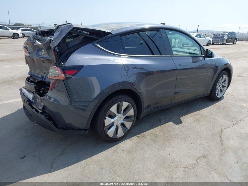 2023 Tesla Model y VIN 7SAYGDEE1PA024149 IAAI salvage auction — REAR END, Salvage (California), sold $5,100 on 2026-07-29 (photo 4)