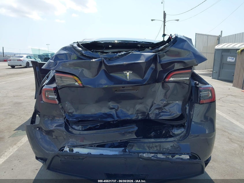2023 Tesla Model y VIN 7SAYGDEE1PA024149 IAAI salvage auction — REAR END, Salvage (California), sold $5,100 on 2026-07-29 (photo 6)