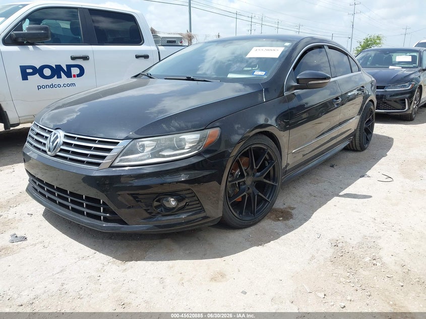 2013 Volkswagen Passat cc VIN WVWAP7AN0DE555414 IAAI salvage auction — NORMAL WEAR, Original (Texas), sold $1,150 on 2026-07-20 (photo 2)