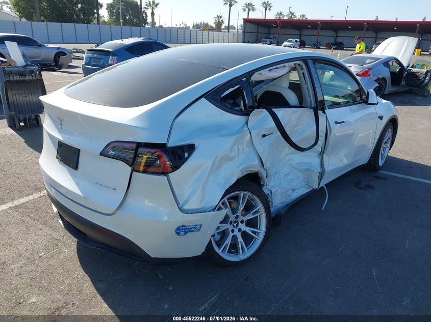 2021 Tesla Model y VIN 5YJYGDEE0MF299023 IAAI salvage auction — RIGHT SIDE, Salvage (California), sold $7,600 on 2026-07-28 (photo 4)